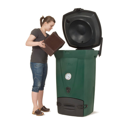 Woman interacting with a green compost bin on a white background
