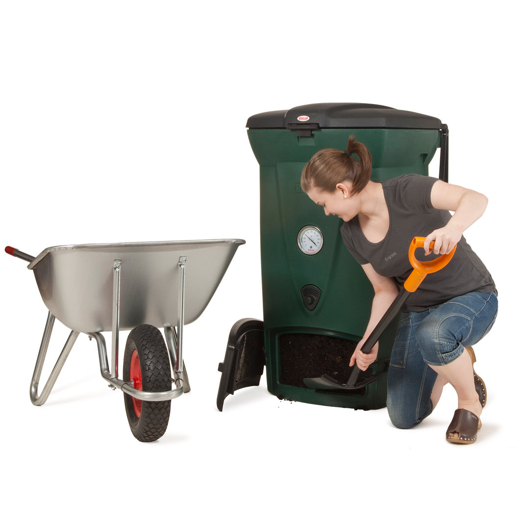 Woman using a composter and a wheelbarrow on a white background